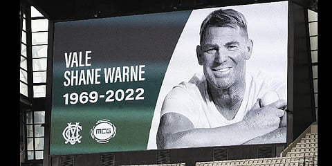 A tribute for cricket legend Shane Warne is displayed on the big screens at the Melbourne Cricket Ground in Melbourne, Australia (File photo| AP)