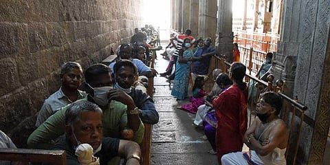 Devotees waiting in  ‘paid darshan’ queue at the temple on Tuesday | MK Ashok Kumar