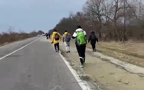 A group of Indian students of Daynlo Halytsky Medical University, Lviv, walk towards the Ukraine-Poland border for evacuation. Image used for representational purpose only. (File Photo | Twitter/ANI)