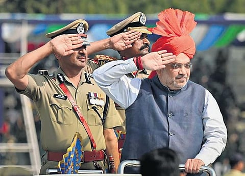 Union Home Minister Amit Shah during the parade at Maulana Azad Stadium  in Jammu on Saturday. ( Photo | PTI)
