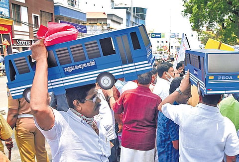 The Bus Owners’ Joint Council staginga protest in front of the Secretariat in Thiruvananthapuram on Monday demanding hike in bus fare  | B P Deepu