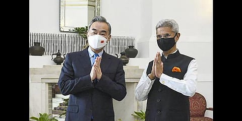 External Affairs Minister S. Jaishankar with China's Foreign Minister Wang Yi, during their meeting, at Hyderabad House.(Photo | PTI)