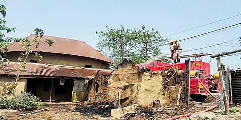 Firemen douse the fire at the incident site where several houses were allegedly set on fire leaving eight people dead, at Rampurhat, in Birbhum. (Photo| ANI)
