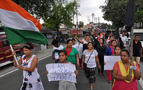 Supporters of GJM raise slogans in a rally to demand for separate State of 'Gorkhaland' in Siliguri. (File | PTI)