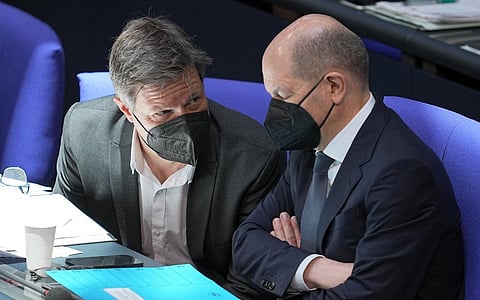 German Economy and Climate Minister Robert Habeck(L) and German Chancellor Olaf Scholz(R) attend a budget debate as part of a meeting of the German federal parliament. (Photo | AP)