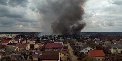 A factory and a store burn after being bombarded in Irpin, on the outskirts of Kyiv, Ukraine, Sunday, March 6, 2022. (Photo | AP)
