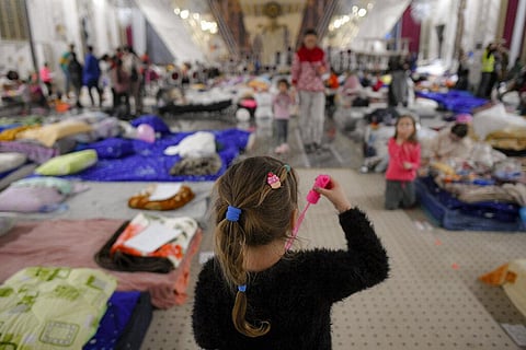 A child refugee who fled the Russian invasion from neighbouring Ukraine plays with a soap bubble toy inside a ballroom converted into a makeshift refugee shelter. (Photo | AP)