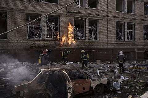Firefighters work to extinguish multiple fires after a Russian attack in Kharkiv, Ukraine, Saturday, April 16, 2022. (Photo | AP)