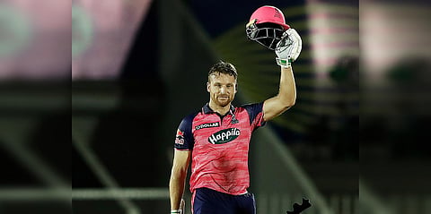 Rajasthan Royals' Jos Buttler celebrates after scoring a ton during an IPL 2022 match against Kolkata Knight Riders, at the Brabourne Stadium in Mumbai. (Photo| PTI)