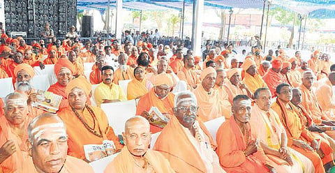 Seers at a programme organised to mark the 115th birth anniversary  of Sri Shivakumara Swamiji in Tumakuru on Friday  | express