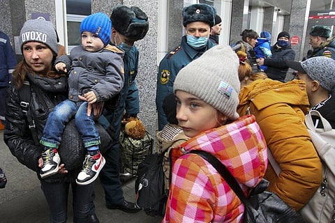 People from the Donetsk and Luhansk regions, the territory controlled by separatist governments in eastern Ukraine, leave a train to be taken to temporary residences in Nizhny Novgorod. (Photo  | AP)