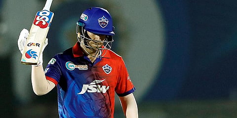 Delhi Capitals batter David Warner celebrates after scoring a half century, during an IPL 2022 match against Punjab Kings, at the Brabourne Stadium in Mumbai. (Photo| PTI)
