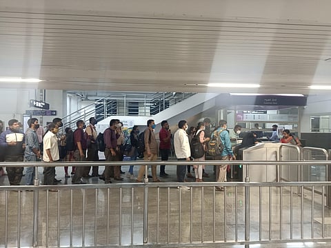 A queue of commuters in a metro station at Bengaluru. (Photo | Express)