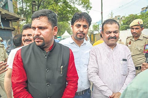 AAP MLAs Sanjeev Jha and Pawan Kumar Sharma at Jahangirpuri on Thursday | Pti