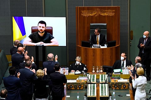 President Volodymyr Zelenskyy addresses the House of Representatives via a video link at Parliament House in Canberra. He  appealed directly to Australian lawmakers for more help . ( Photo | AP)