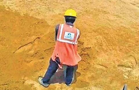 Pits near Srimandir being refilled with sand