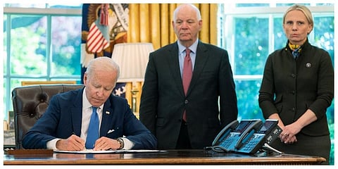 President Joe Biden signs the Ukraine Democracy Defense Lend-Lease Act of 2022 in the Oval Office of the White House, Monday, May 9, 2022, in Washington.  (Photo | AP)