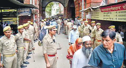 Police outside a Varanasi court during hearing of Gyanvapi mosque survey case. (Photo | PTI)