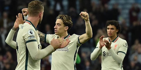 Liverpool players celebrate after the end of the English Premier League soccer match between Aston Villa and Liverpool at Villa Park in Birmingham. (Photo | AP)
