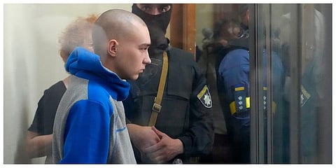 Russian army Sergeant Vadim Shishimarin, 21, is seen behind a glass during a court hearing in Kyiv, Ukraine, Friday, May 13, 2022.  (Photo | AP)
