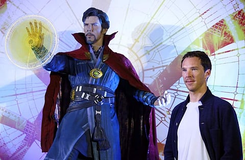Actor Benedict Cumberbatch poses with a life-size figure of his character from the movie. (Photo | AP)