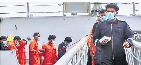 Survivors of Barge P-305 that sank off the Mumbai coast walk out from the Indian naval ship INS Kochi in Mumbai  | File Photo