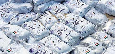 A consignment of humanitarian aid supplied by India to Sri Lanka, at a port in Colombo on Sunday. The aid includes rice, milk powder, and medicines | AFP