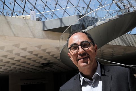 Jean-Luc Martinez poses during a visit of the Louvre museum. (Photo | AP)