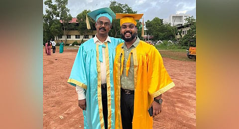 Hareendrakumar V R with his son Amal Jishnu after the convocation. (Photo | Special Arrangement) 