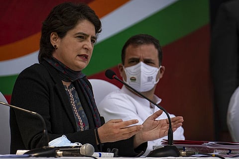 Congress party General Secretary Priyanka Gandhi Vadra, left, flanked by her brother and party leader Rahul Gandhi. (File Photo | AP)