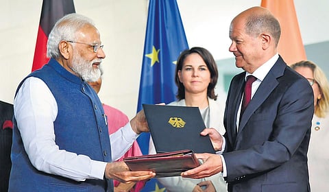 Prime Minister Narendra Modi with German Chancellor  Olaf Scholz, after their sixth inter-governmental consultations, in Berlin on Monday | PTI