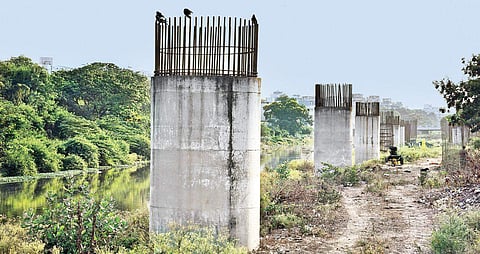 Pillars erected for the Maduravoyal-Port project at Chetpet. (File photo | Martin Louis, EPS)