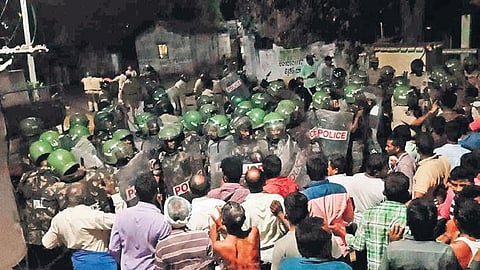 A large number of police personnel enter Gudatipalli village in the early hours of  Monday