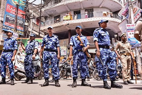 Security personnel patrol to maintain law and order amid communal tension, in the wake of Friday's violence, in Kanpur. (Photo | PTI)