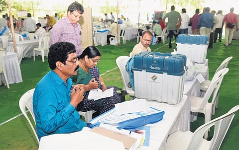 ​​Election material being distributed to polling staff in Atmakur Assembly constituency on Wednesday I Express