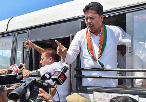 Assam Pradesh Congress Committee President Bhupen Kumar Borah being detained by police during a protest against rebel Shiv Sena leader Eknath Shinde, in Guwahati, on June 24, 2022. 