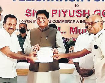 Representatives of the Dyers Association of Tiruppur give a petition to Union minister Piyush Goyal on Sunday. (Photo | Express)