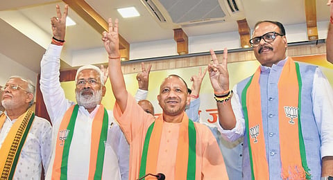 UP CM Yogi Adityanath, BJP state president Swatantra Dev Singh, Deputy CM Brajesh Pathak celebrate the party’s victory in bypolls, in Lucknow, on Sunday | PTI
