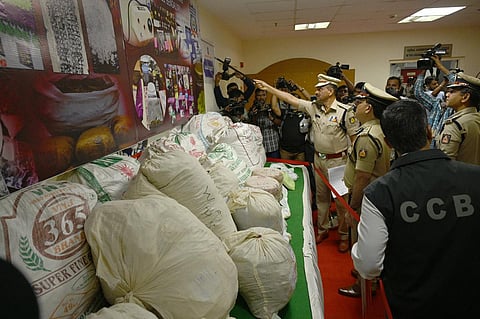City Police Commissioner Pratap Reddy inspects the seized drugs in Bengaluru  on Sunday. (Photo | Nagaraja Gadekal, EPS)