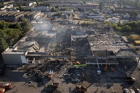 Russian long-range bombers struck a crowded shopping mall in Ukraine's central city of Kremenchuk with a missile on June 27, 2022. (Photo | AP)
