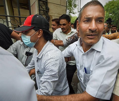 AltNews co-founder Muhammad Zubair being taken to the Patiala House Courts, following his arrest by special cell of Delhi Police. (Photo | PTI)