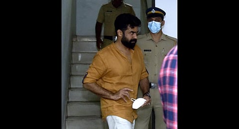 Actor-producer Vijay Babu being taken for quizzing to the Thevara police station on Monday  | A Sanesh