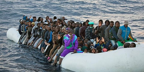 Migrants crowded aboard a rubber boat sailing out of control in the Mediterranean Sea about 21 miles north of Sabratha, Libya Image used for representation. (File Photo | AP)