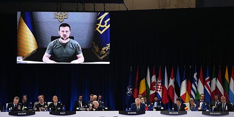 Zelenskyy addresses leaders via a video screen during a round table meeting at a NATO summit in Madrid, Spain on Wednesday, June 29, 2022. (Photo  | AP)