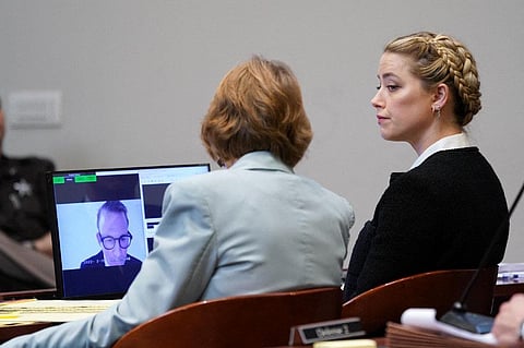 Hollywood actor Amber Heard during the 50 million US dollar Depp vs Heard defamation trial at the Fairfax County Circuit Court. (Photo |AFP)