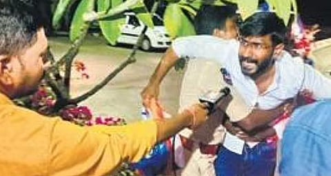 Cops detain NSUI leader Venkat Balmoor after a protest 
