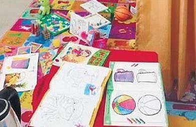 The child-friendly space with drawing books and toys