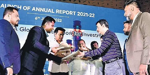 An MoU being exchanged in the presence of Industries & IT Minister KT Rama Rao during the release of 2021-22 annual report of industries department in Hyderabad on Monday