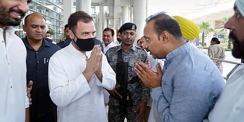 Congress leader Rahul Gandhi being greeted on his arrival at Mohali airport. (Photo | PTI)