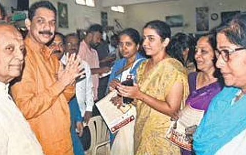 BJP state president Nalin Kumar Kateel campaigns for Basavaraj Horatti at a college in Hubballi on Monday | D HEMANTH